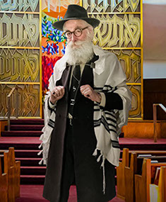 Peter Xifo - Orthodox Rabbi; standing